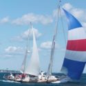 Punching Through the Stream, the Pack Nears Bermuda Inisharon under light sails in the 2012 race. (Barry Pickthall/PPL)
