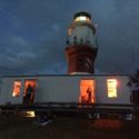 Race Bulletin #19 – Ecclestone & Merlin Interviews, Sunrise Finishes Finish line at St. Davids Lighthouse