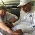 Merlin’s Path: Spinnaker Repair with the Usual Vlad Kat Malone and Kulli Kulinichenko repair spinnaker on Merlin