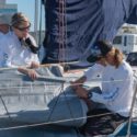 Merlin’s Path: Downwind Flyer Needs Upwind Boost Kat Malone (left) and James Clappier put battens into the leech of one of Merlin’s three new jibs for upwind and close reaching.