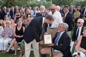 Bermuda Governor George Ferguson presents a prize to Pete Rebovich. (Barry Pickthall PPL)