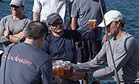 Owner George Sakellaris sharing celebratory Dark 'n Stormies with his crew.  (Talbot Wilson/PPL)