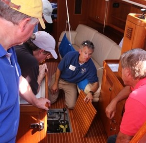James Phyfe explores a manual bilge pump at Annapolis Offshore Preparadeness Seminar.