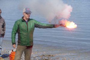 It looks easy, but flares are very hot and a little risky and require very careful handlling. This is part of the hands-on segment at the Cruising Club of America seminar in March (Ernie Godshalk)