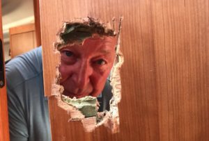 Jim Binch and damaged door on Killua